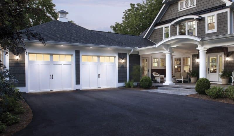 Custom Garage door with white colors and barn syle opener