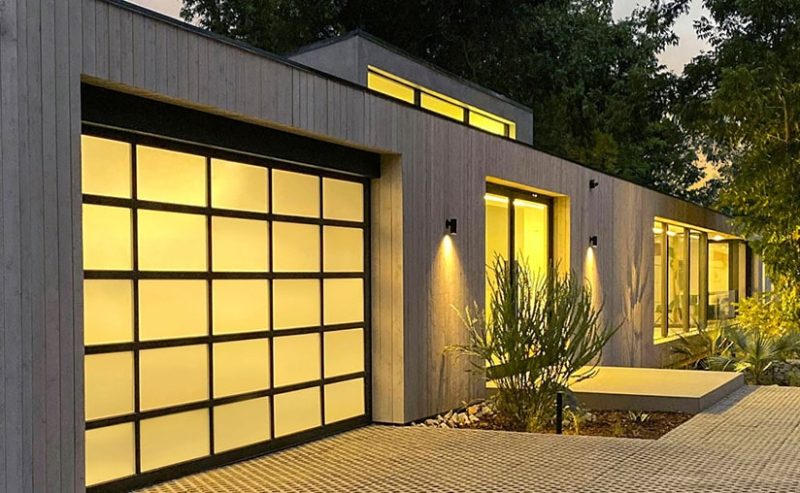 Garage doors with light coming through the frosted glass